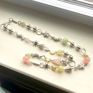 Whimsical necklace with stones, stars, moons and assorted pieces.  30”